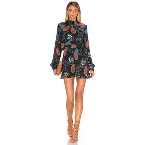 NWT. ASTR the Label. Eva Romper in Dark Green Floral. Size XS.